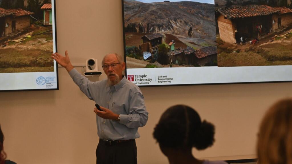 Robert Ryan delivers presentation.