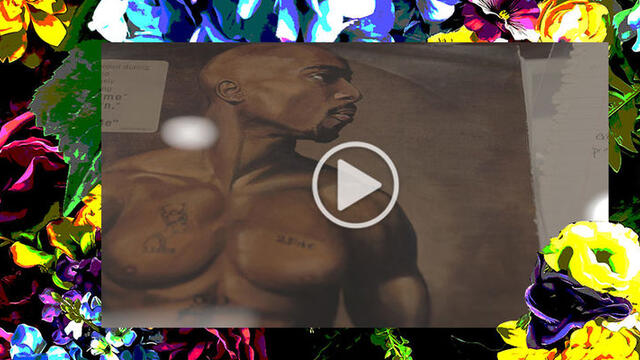 A floral border surrounding a painting of Tupac Shakur.
