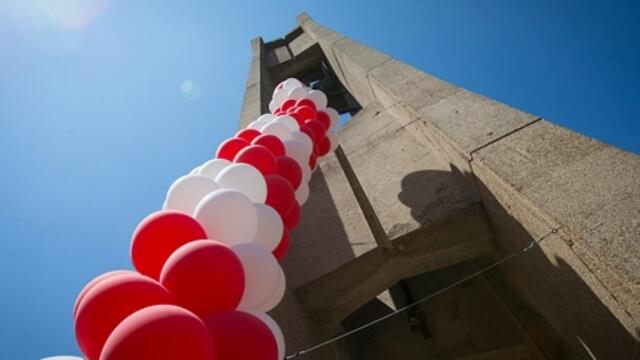 Cherry and white balloons decorating the bell tower.
