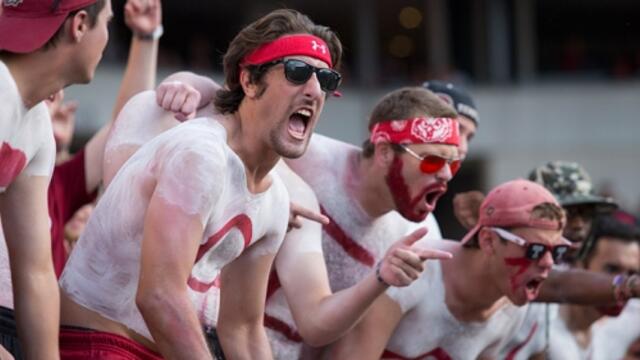 The Cherry Crusade cheering on the football team at the Penn State game.