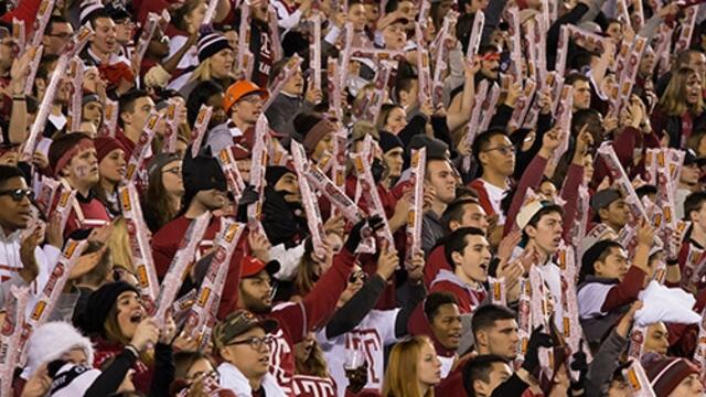 A cherry and white clad crowd cheers on the Temple football team at Lincoln Financial Field.