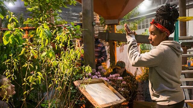 A team from Temple Ambler building their Philadelphia Flower Show exhibit.