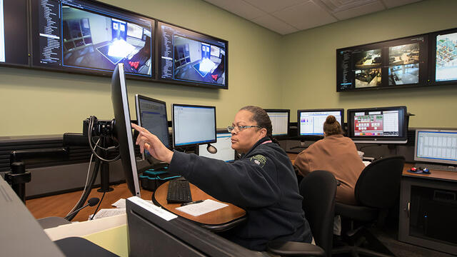 A woman working in the new dispatch center.