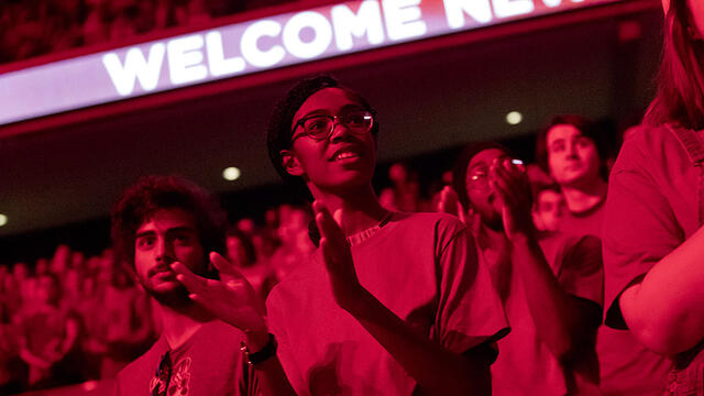 New Temple students clap during a post-Convocation pep rally