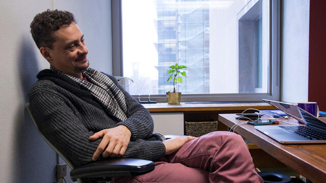 Victor Gutierrez-Velez sitting at his desk