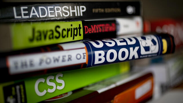 a stack of textbooks