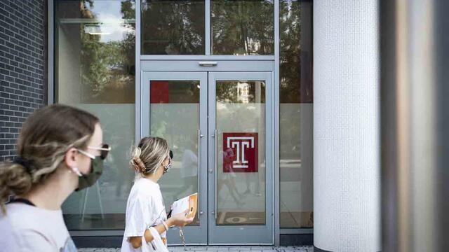 Students walk along Cecil B. Moore Avenue.