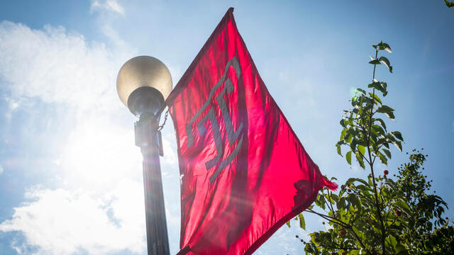A Temple flag flies on Ambler Campus.