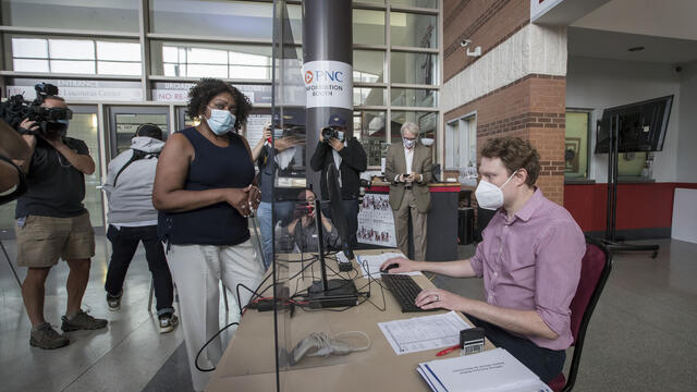 a voter casting a vote.