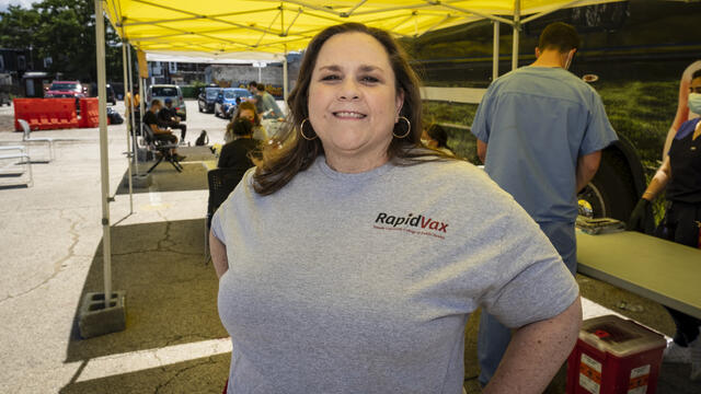 Sarah Bass helping at a neighborhood vaccine clinc