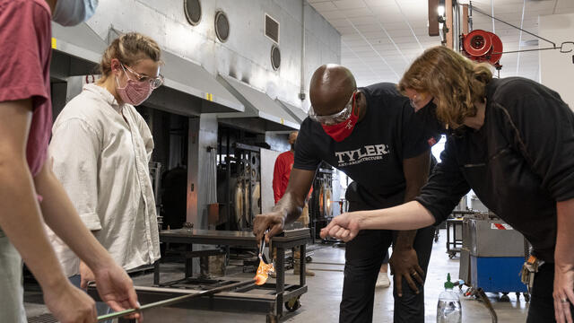 President Wingard in a glassmaking course.