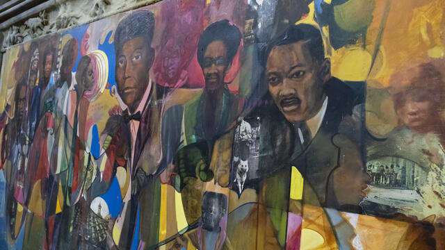 Image of Black history mural inside the Church of Advocate.
