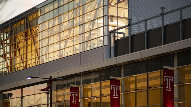 Image of a building with Temple flags.
