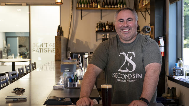 Mike Beresky pictured behind the Second Sin bar.