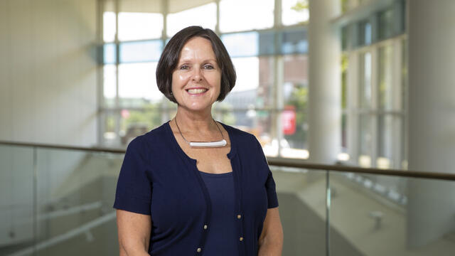 Magee stands in the atrium of Boyer College of Music and Dance