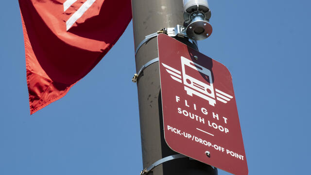 Image of a Flight pick-up point sign.