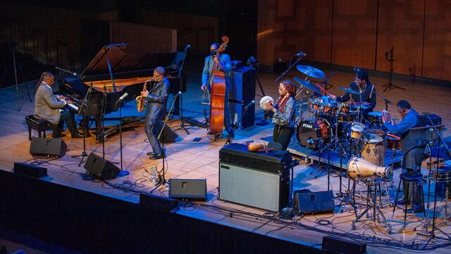 Image of Kenny Garrett s band performing at the Temple Performing Arts Center.