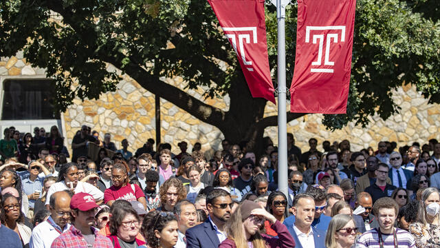 A crowd of people standing on Beury Beach