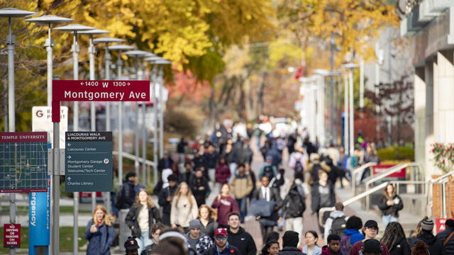 Temple students walking across campus.