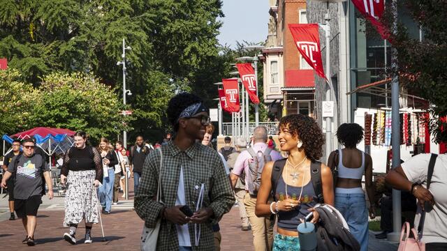 Students walking on campus during the first day of classes.
