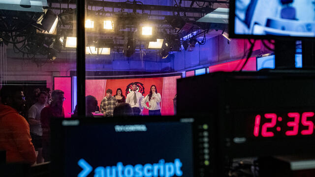 Image of Temple students in the Owl Update studio.