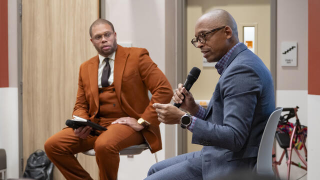 Timothy Welbeck pictured with Khalil G. Muhammad.