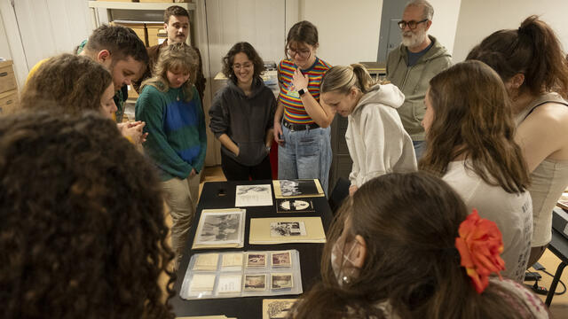 Students looking at archival materials in the William Way LGBT Community Center