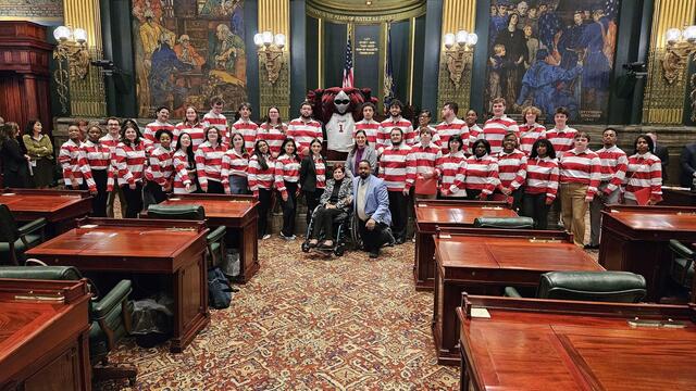 Students, Hooter, Sen. Christine Tartaglione (D-2), Sen. Amanda Cappelletti (D-17), and Sen. Sharif Street (D-3) on the floor of the Senate of Pennsylvania.