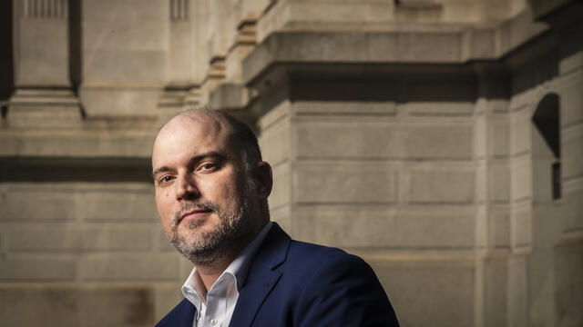 Jonathan Larsen outside of City Hall