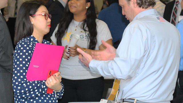 student and recruiter speaking