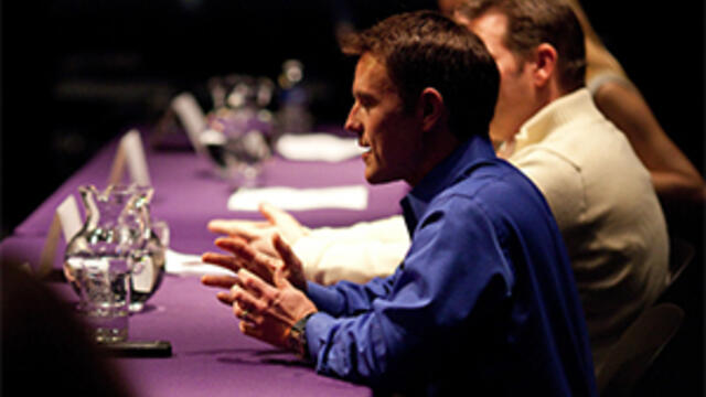 People in a panel discussion