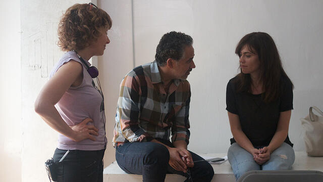 A group of people on a film set.