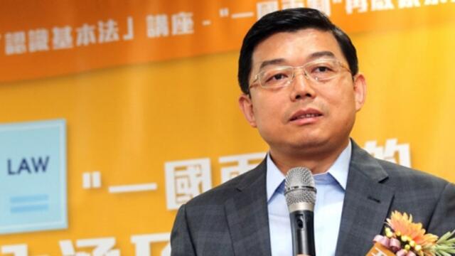 Zhenmin Wang giving a speech in China.