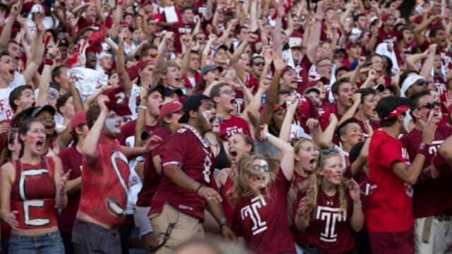 Owls fans dressed in Cherry and White