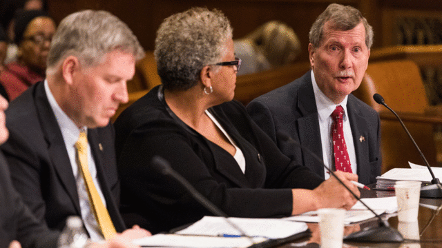 President Richard M. Englert giving testimony