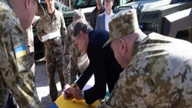 image of men in military gear and congressman