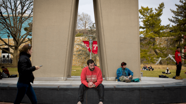 A graphic of Adam Sandler at the Bell Tower.