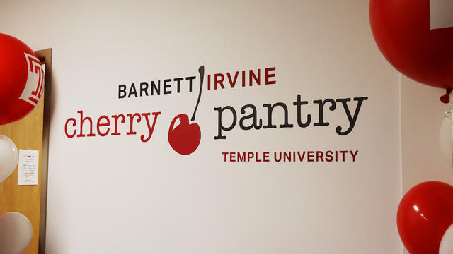 A sign reading Barnett Irvine Cherry Pantry