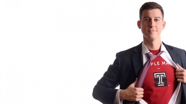 Alumnus Ed Boyanoski strikes a superhero pose in a Temple T-shirt.