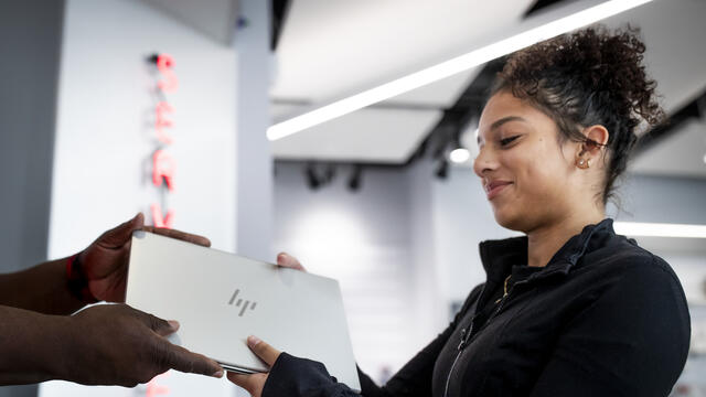  Image of student using a laptop at Temple’s Digital Access Center. 