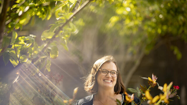 Temple researcher Meghan Kane in Founder's Garden on Temple's campus.