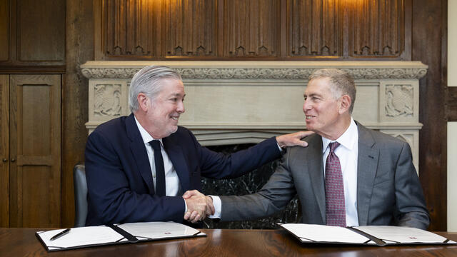 President Fry and Michael Spolan at a gift signing.