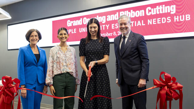Jodi Bailey Accavallo cutting the ribbon at the Essential Needs Hub alongside Temple President John Fry, Alexis Gonsalves and Valerie Arkoosh