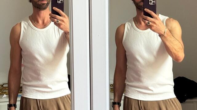 Prof. Damon Young - Taking a selfie - man with dark hair taking a picture in the mirror with a cell phone