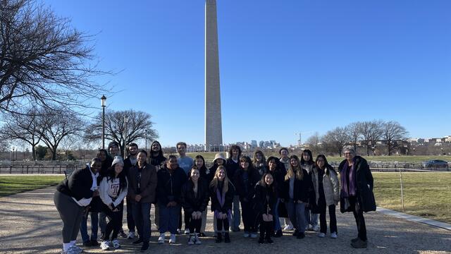 Students standing in front of the Washington Monument