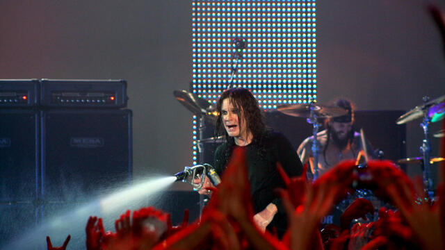 Ozzy Osbourne spraying crowd with a hose