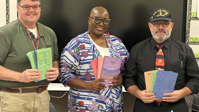 Len Clark, director of emergency management (left), standing next to third-grade teacher Ms. Berry and Joe Spera (right), director of technology for Temple s Public Safety Department. Clark and Spera are both veterans and spoke to Ms. Berry's class about Veterans Day.