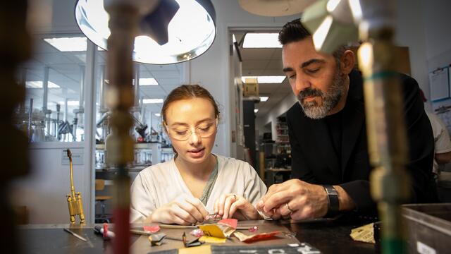 Image of MJCC program head Doug Bucci working with a student.