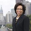 Temple Law School Dean JoAnn Epps with City Hall in the background.