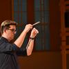 Image of Baker Purdon conducting a choir.
